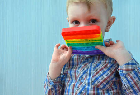 Boy with a toy.