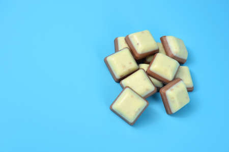 Bars of chocolate on a blue background