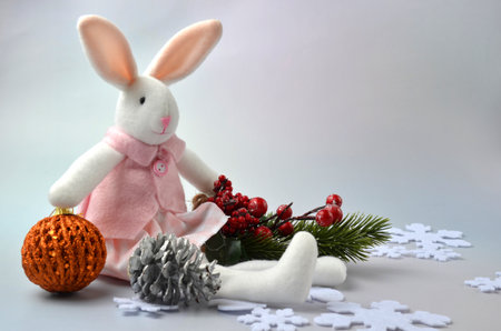 Christmas balls and a rabbit on a white background. new year 2023の写真素材