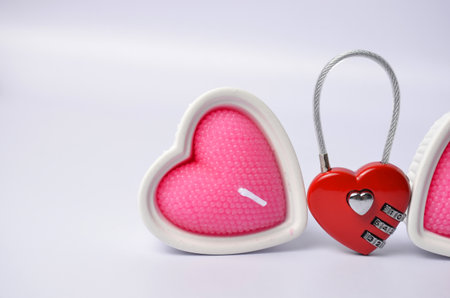 Candle pink heart and red castle on a blue background. Valentine's Dayの写真素材