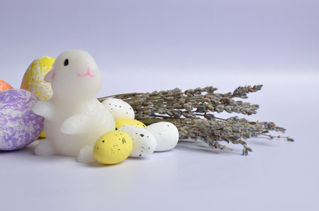 Easter Bunny. Easter eggs. Bouquet of Lavender. Easter. Light purple background