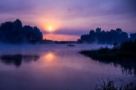 Sunrise on a lakeの写真素材