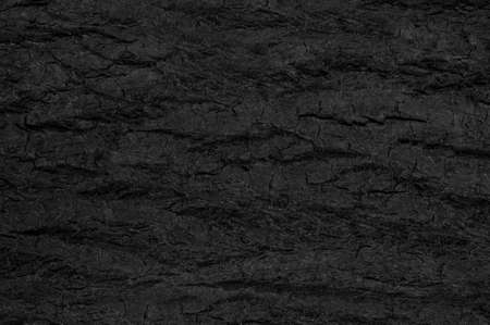 Grunge texture. Dark stone. Burned woodの写真素材
