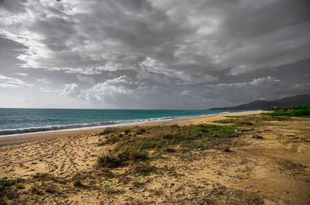 Empty beach with footprintsの写真素材