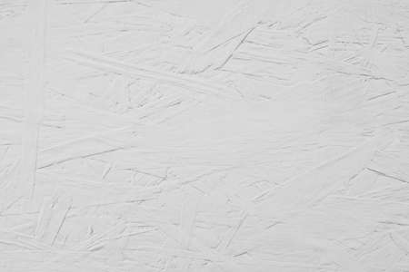 Board painted of white color. White OSB wood wall texture backgroundの写真素材