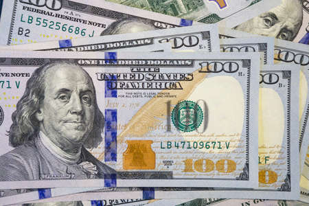 Money background of new hundred dollar bills cash