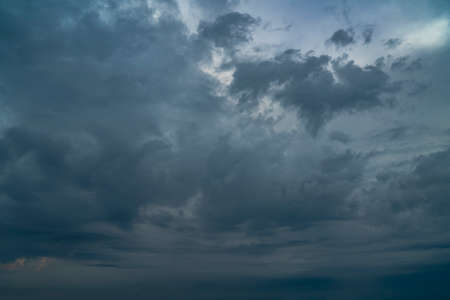 Dramatic dark cloudy sky before a thunderstorm. Moody cloudscape background