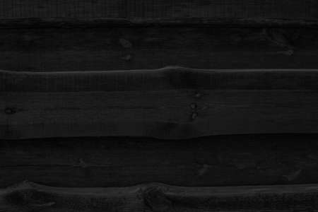 Black charcoal board, background of burnt wood texture.の写真素材