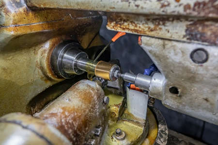 CNC machining of metal detail. Industrial milling cutting metalworking process.