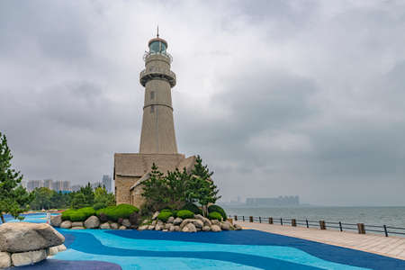 Lighthouse by day. Marine embankment of Weihai, Chinaの写真素材