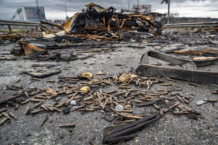 Borodyanka, Kyiv region, Ukraine - 5 April 2022. War combat projectiles and bullets on road with...