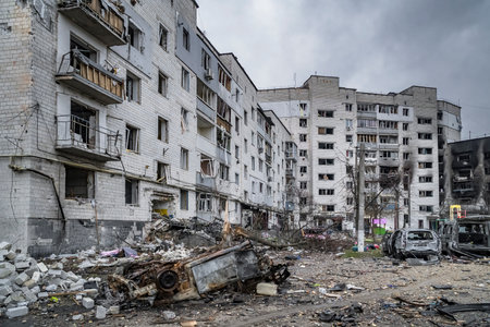 Borodyanka, Kyiv region, Ukraine - 5 April 2022. City after bombing, civilian buildings, burnt cars destroyed by russian occupiersのeditorial素材