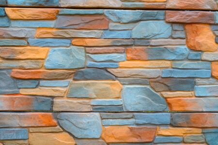 Multicolored stone wall background for art design.