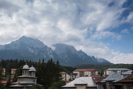 Landscape of small city on background of Carpathians Mountainsの写真素材
