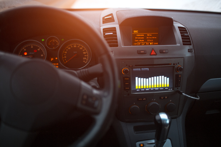 Close-up of car audio system with equalizer.の写真素材