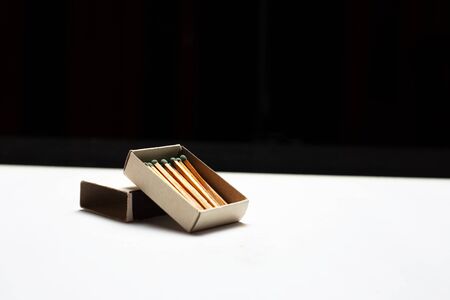 Close-up of opened matchbox with mockup.