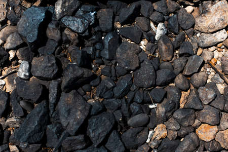 Natural abstract textured background of black stones.の写真素材