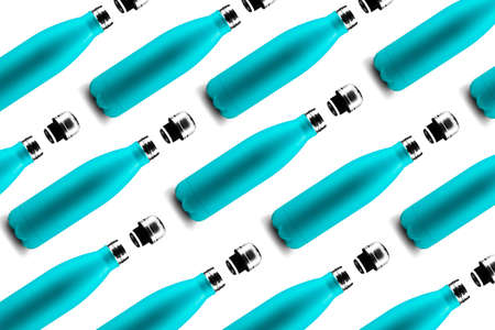 Bottles pattern. Colorful eco, reusable steel thermo water bottle of cyan color, isolated on white background. Zero waste. Say no to plastic.の写真素材