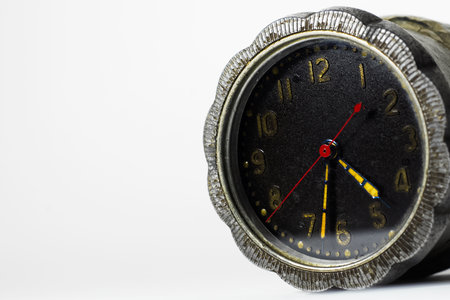 Close-up of vintage alarm clock isolated on white background with copy space.の写真素材