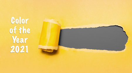 Color of the year 2021; Illuminating and Ultimate Gray. Torn yellow paper.