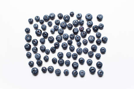 Studio picture of blueberries spread on the white background.の写真素材
