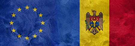 Textured photo of the flag of European Union and Moldova.の写真素材