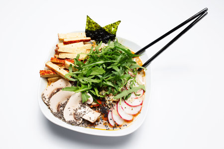 Vegan food. Japanese ramen noodles miso soup with tofu, mushrooms and greens.の写真素材