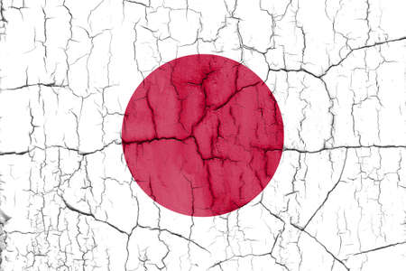 Textured photo of the flag of Japan with cracks.の写真素材