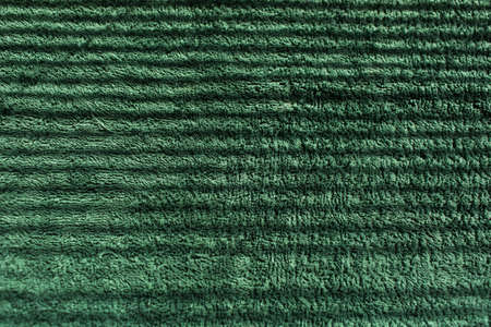 Natural abstract background of green towel striped from shadows.の写真素材