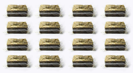 Pattern of sealed smoked green tofu isolated on white background.の写真素材