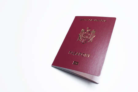 Close-up of Moldavian passport of red color, on white background.の写真素材