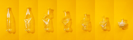 Collection of empty recycled plastic bottles from full to crumpled, photo collage on yellow background. Panoramic banner view.の写真素材