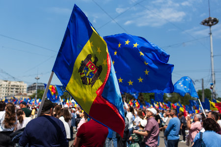 Assembly of the European Moldova. National meeting of the Moldavian people. Flag of the European Union and Republic of Moldova. Chisinau, Moldova - 21 May 2023.のeditorial素材
