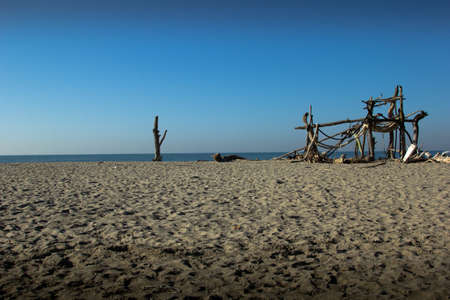 wooden artistic construction on the beachの写真素材