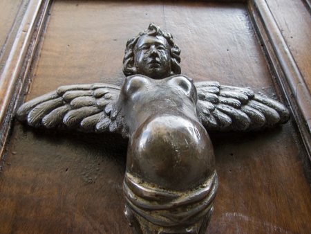 Door handle in the shape of an angelの写真素材