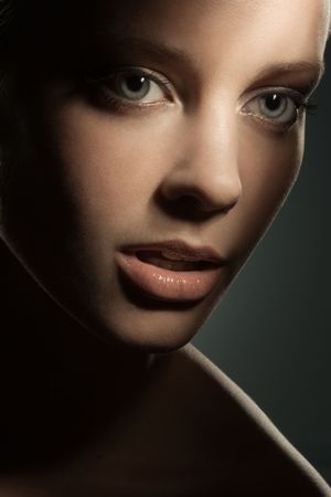 Beauty image of woman's face in shadowsの写真素材