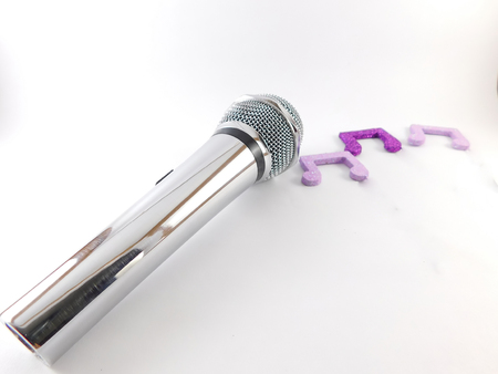 With three violet microphone musical notes.の写真素材
