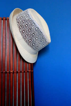 White summer hat on a wooden objectの写真素材