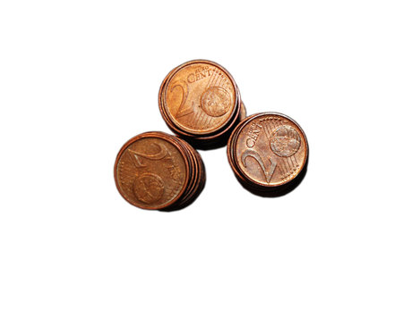 Loose change coins stacks on white background
