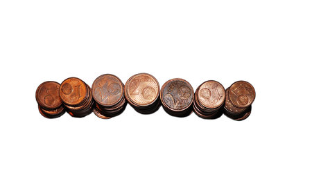 Loose change coins stacks on white background