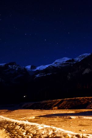 Night shot of Monte Rosa glacier and iced riverの写真素材