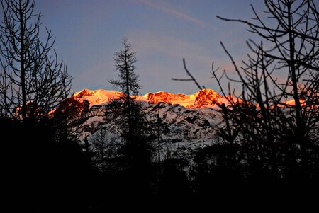 The sunset over Monte Rosa glacier, Italyの写真素材