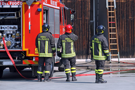 firefighters during a training exercise in their fire station