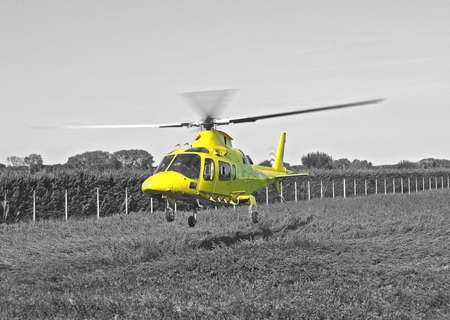 yellow helicopter rescue air ambulance take-off BNの写真素材