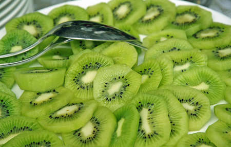 plate of delicious green kiwi great rich in vitamin Cの写真素材