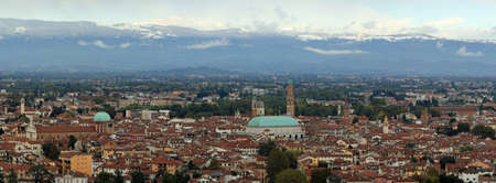 wide view of the city of Vicenza with snow-capped mountainsの写真素材