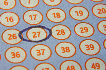 tab of the lottery with a circled numberの写真素材