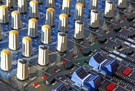 potentiometers trimmers and a mixer during a rock concert