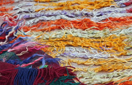 wires and strings of a wool sweater for sale at the market