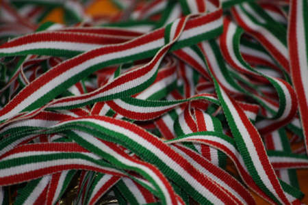many Italian flag use tape to secure the medals of athletesの写真素材